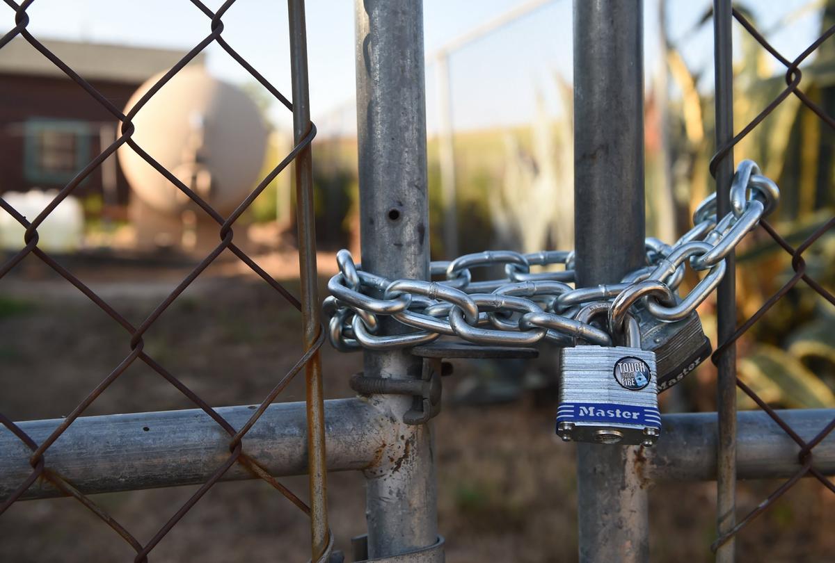 A water well shown behind locked fencing, Friday, April 12, 2019 in Tooleville, CA.
