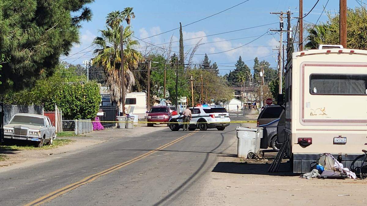 Deputies investigate an incident where a man was found with an arrow sticking out his chest in Fresno, California on Friday, March 22, 2024.