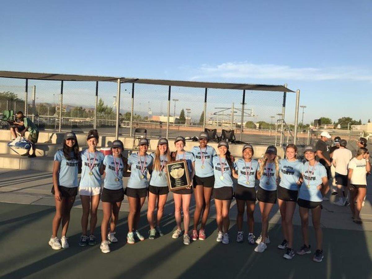 Clovis North take a group photo after winning the Central Division Division I championship.