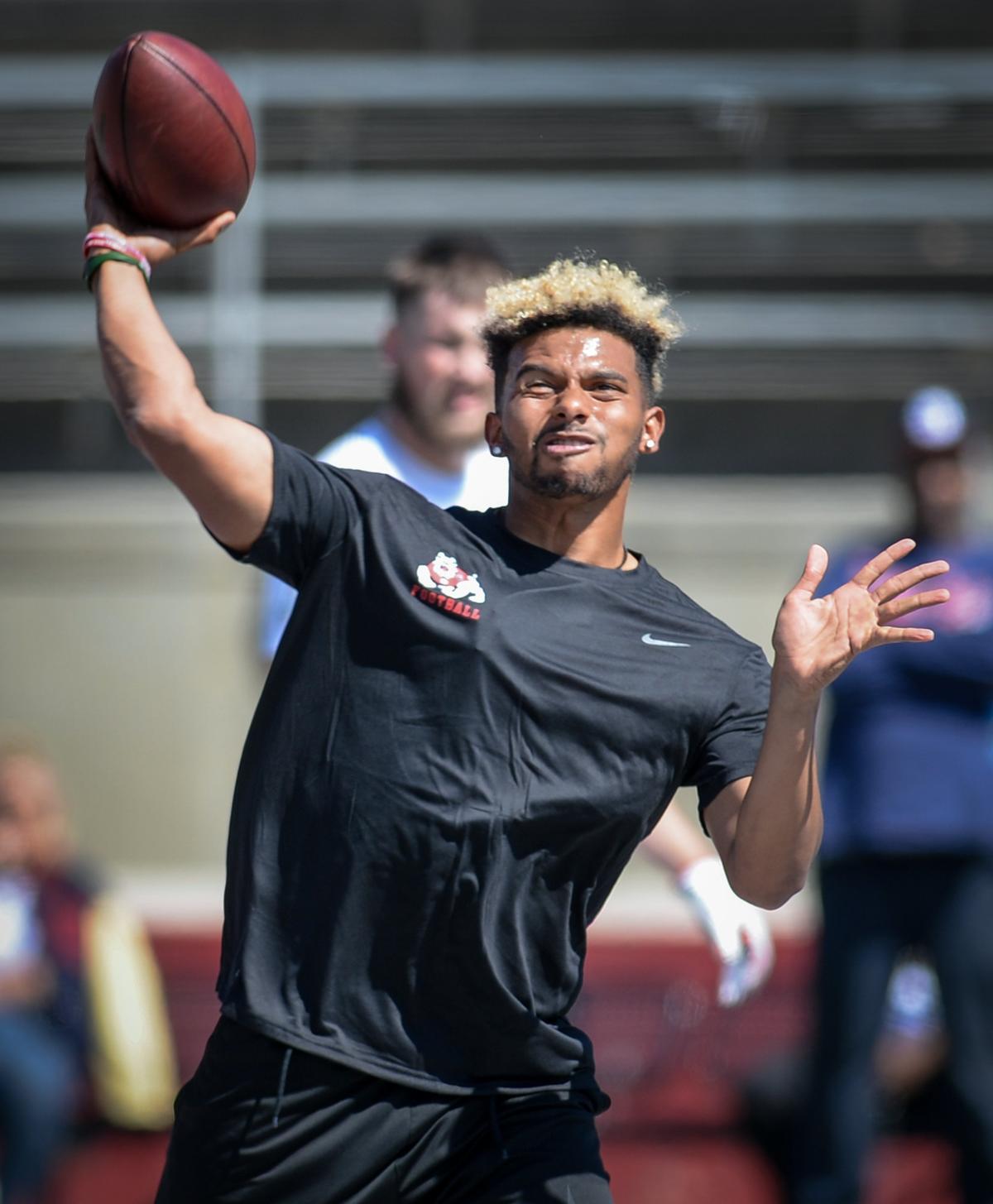 Fresno State quarterback Marcus McMaryion fires a pass for NFL scouts on Pro Day at Bulldog Stadium on Monday, March 18, 2019.