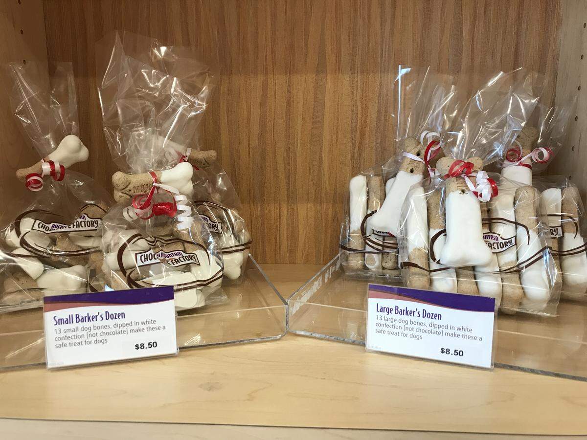 Rocky Mountain Chocolate Factory sells treats for people and dogs, including these bones dipped in a candy coating that’s nontoxic to dogs.