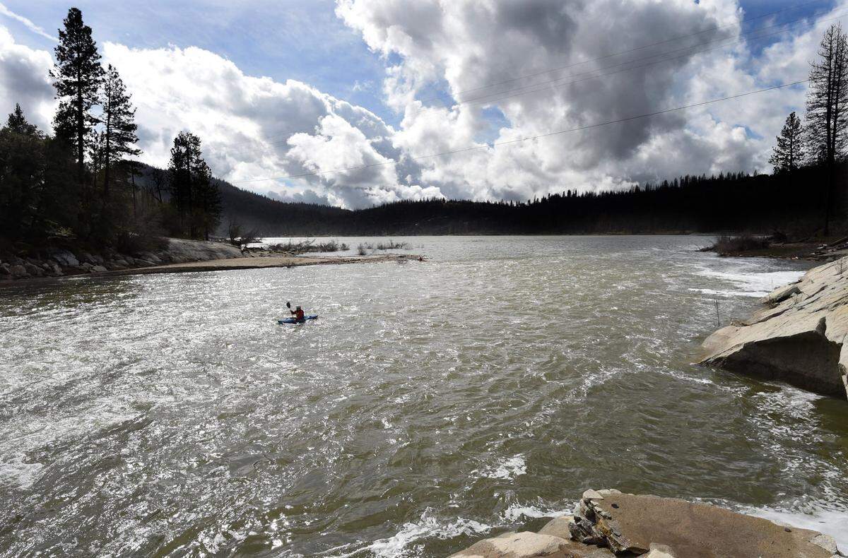 Bass Lake in Madera County is almost completely encircled by national forest lands that could potentially be up for auction if a public lands selloff is included in President Trump’s “big, beautiful bill.”