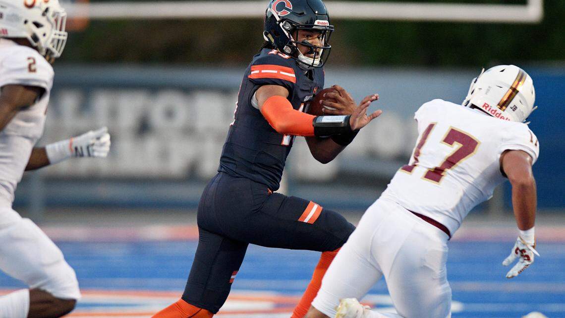 Chaminade quarterback Jaylen Henderson runs for yardage against Alemany, Saturday, April 10, 2021, at Chaminade High School. (Photo by Michael Owen Baker, contributing photographer)