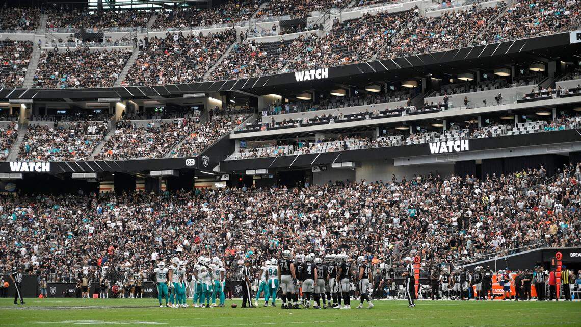 Fans fill Allegiant Stadium during overtime of an NFL football game between the Las Vegas Raiders and the Miami Dolphins, Sunday, Sept. 26, 2021, in Las Vegas.