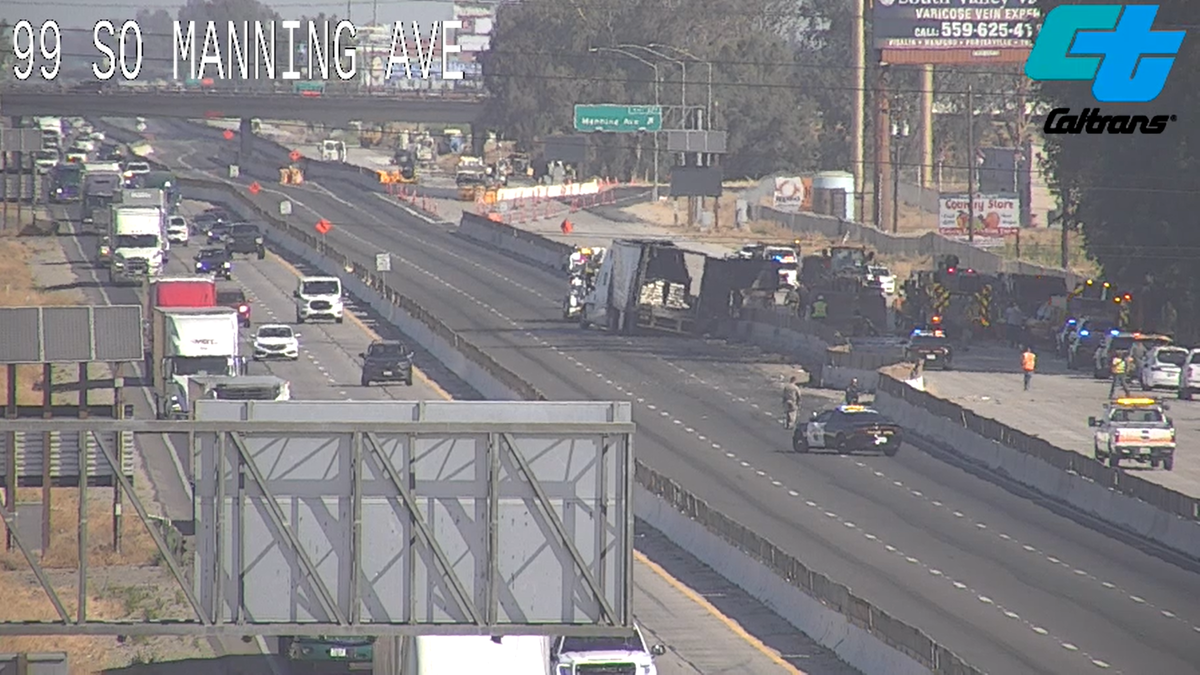 A Caltrans camera looking north on Highway 99 toward the Manning Avenue exit south of Fowler shows the scene of a crash between a big rig and a sedan on Thursday morning, July 7, 2022.