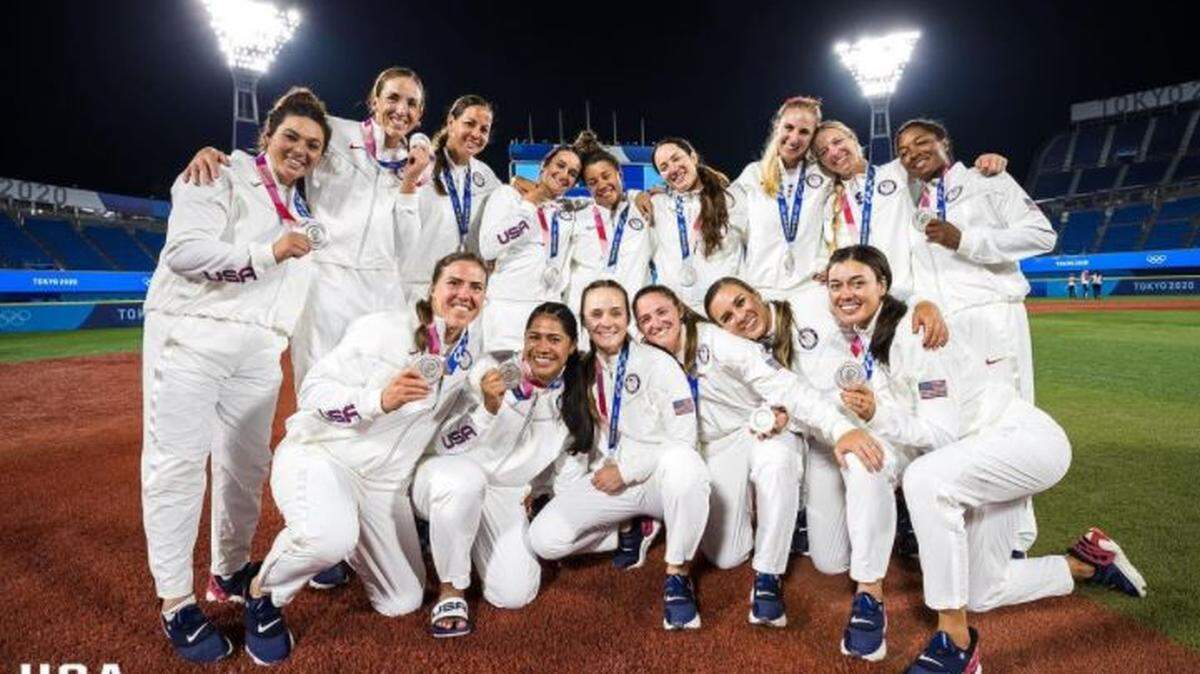 Merced native Madilyn “Bubba” Nickles, first row, second from right, is shown with the USA National Softball Team after winning silver medals at the Tokyo Olympics.