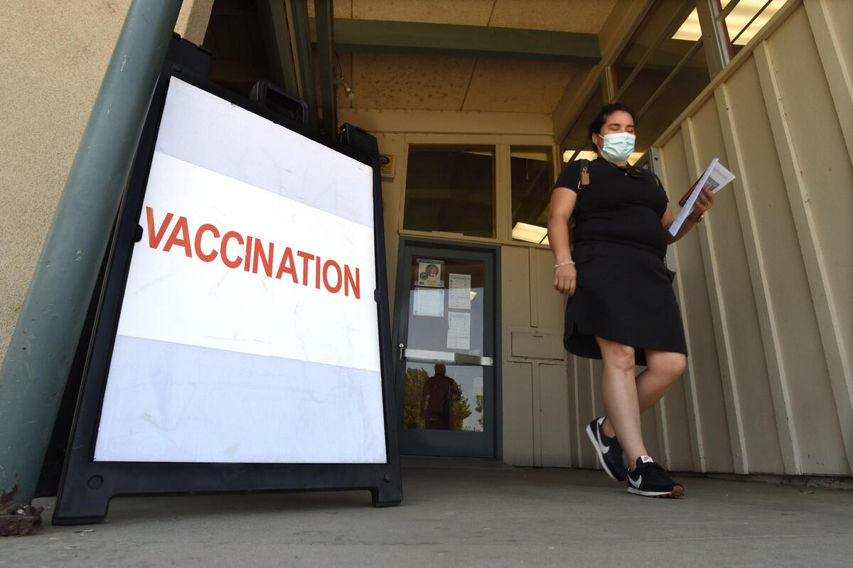 Emily Villa of Pixley leaves the Tipton Library after being vaccinated during a clinic on July 29, 2021. Villa, president of the Pixley Union School District, said she got vaccinated not only to protect herself from COVID-19, but all the people she comes in contact with. She is especially concerned about her husband, who underwent a kidney transplant two years ago. She said she told him before leaving for the clinic that if he continues to refuse to get vaccinated, then she will need to make sure his life insurance is up to date, so that if he passes, she has money to bury him.