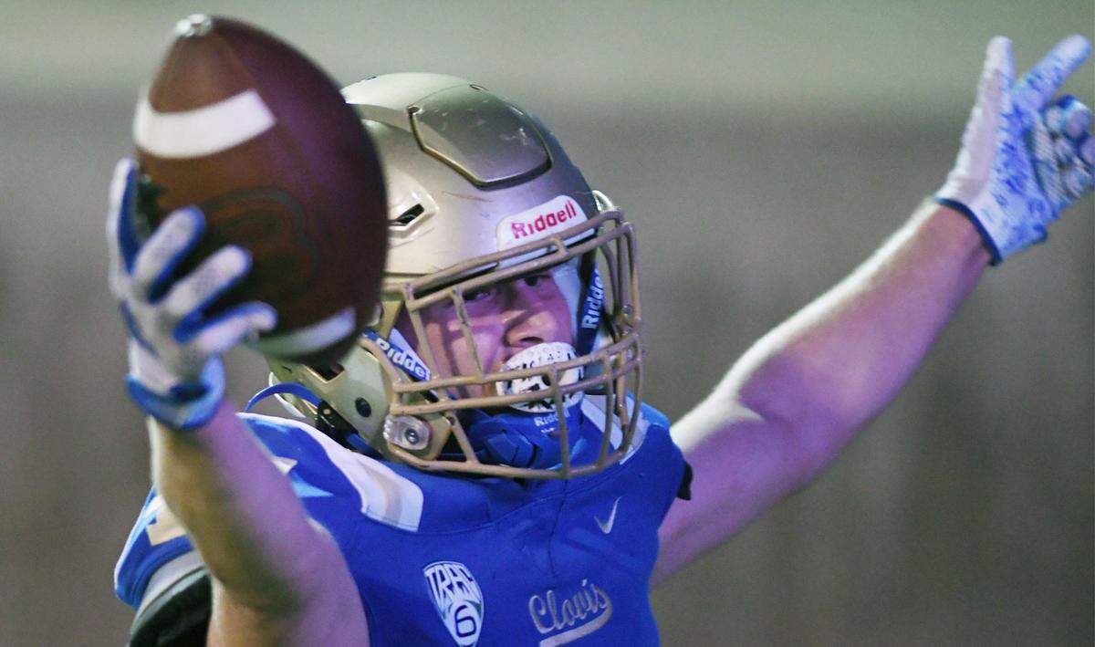 Clovis High’s Wyatt Merkord scores a touchdown against Central Thursday, Sept. 29, 2022 in Clovis.