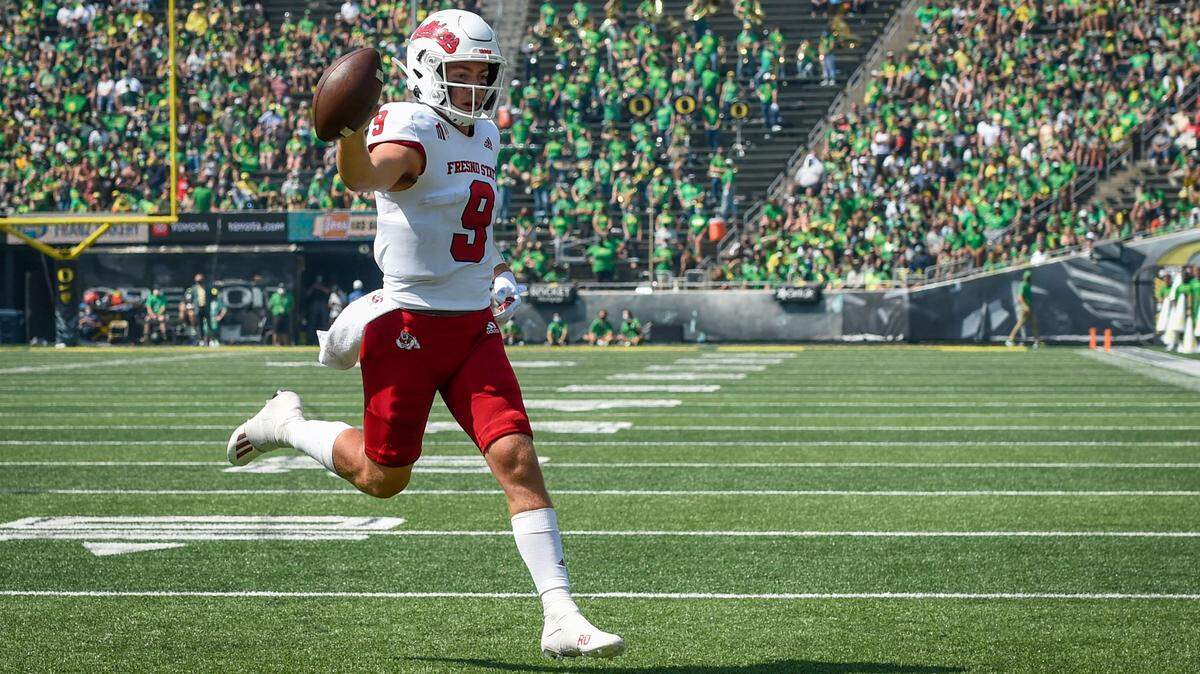 Fresno State quarterback Jake Haener scores during the third quarter against Oregon on Saturday, Sept. 4, 2021, in Eugene, Ore.