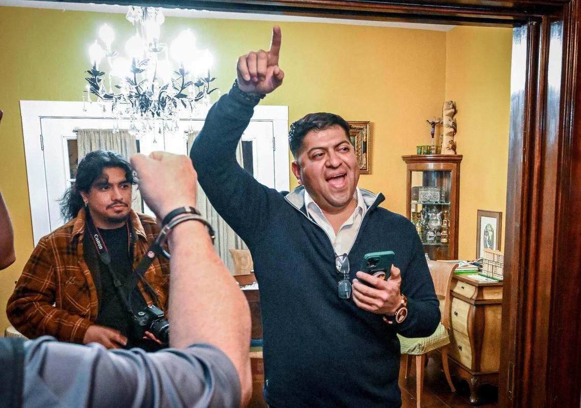 Fresno County Board of Supervisors candidate Luis Chavez cheers after seeing election results showing him leading incumbent Sal Quintero during an election watch party with supporters at Chavez’s home in Fresno on Tuesday, Nov. 5, 2024.
