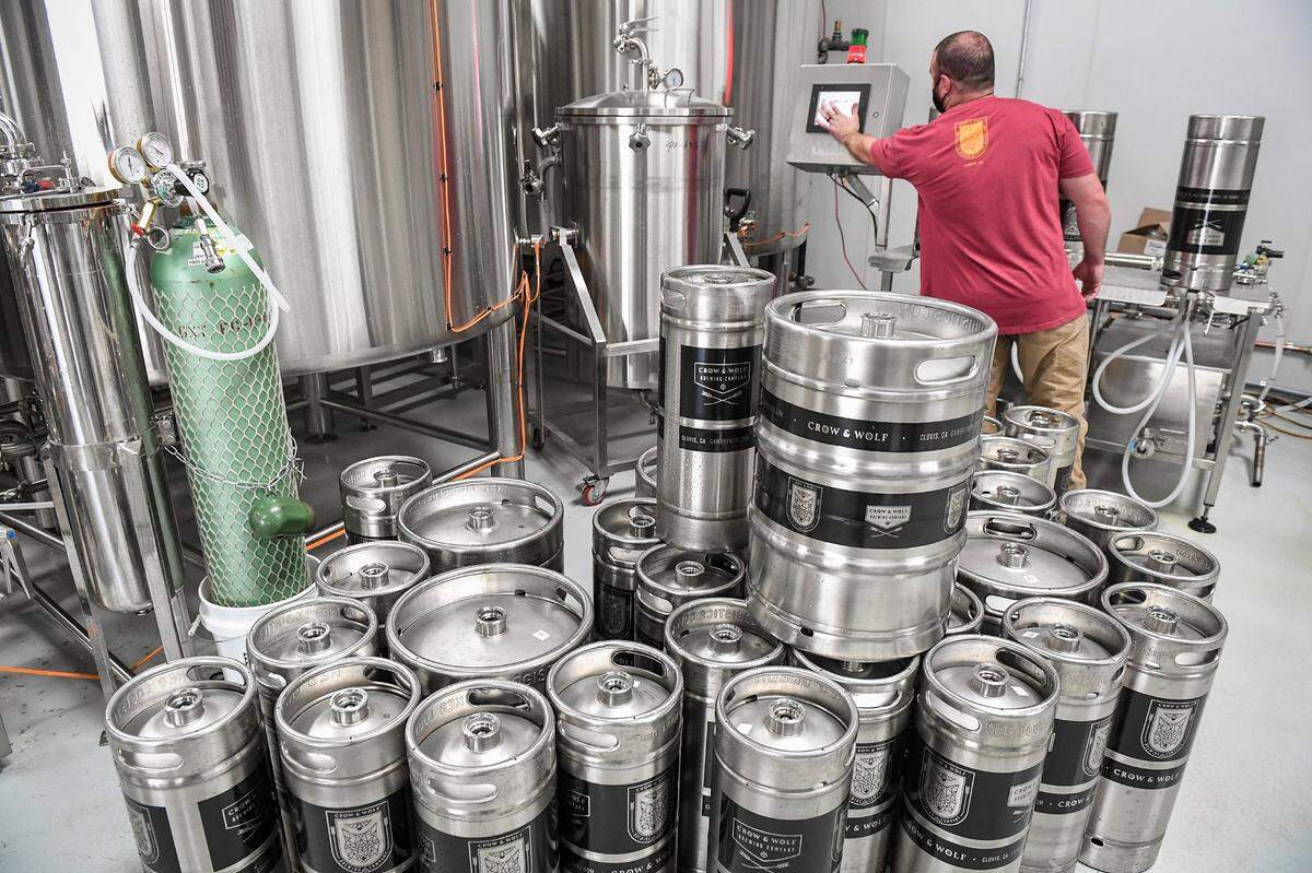 Dozens of beer kegs await cleaning at Crow & Wolf Brewing in Clovis, a craft brewery with offering a large selection of lagers, ales, ciders and seltzers.