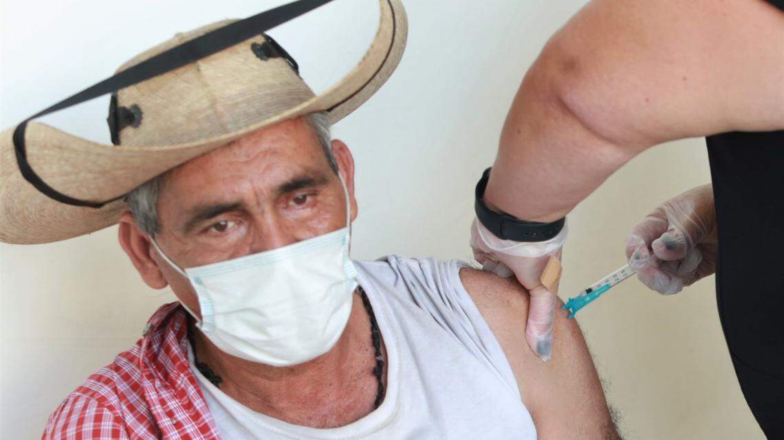 J. Jesús Rivera Mendoza, 65, of Dos Palos, is shown getting a COVID vaccine at an event in Firebaugh on June 11, 2021.