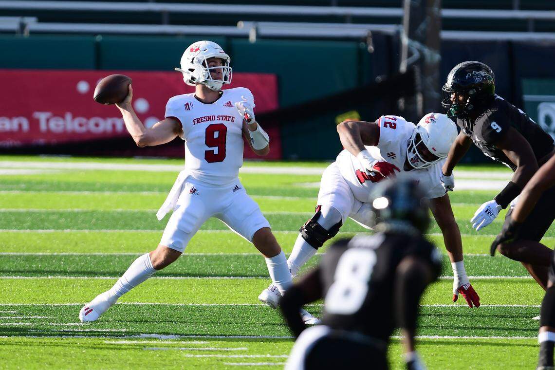 Fresno State quarterback Jake Haener gets off a pass in the No. 18 Bulldogs’ 27-24 loss the Hawaii Rainbow Warriors Saturday, Oct. 2, 2021. Haener hit 28 of 50 passes for 388 yards with three touchdowns, but four interceptions. He has passed for 300 or more yards in four games in a row and five of six this season.
