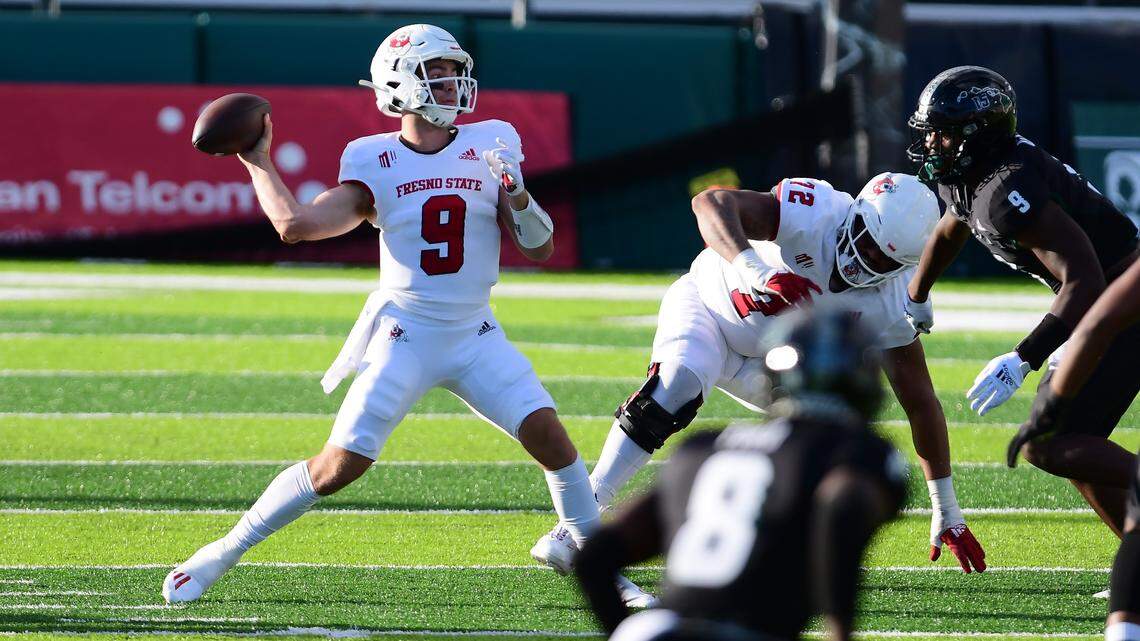 Fresno State quarterback Jake Haener gets off a pass in the No. 18 Bulldogs game against the Hawaii Rainbow Warriors Saturday, Oct. 2, 2021.
