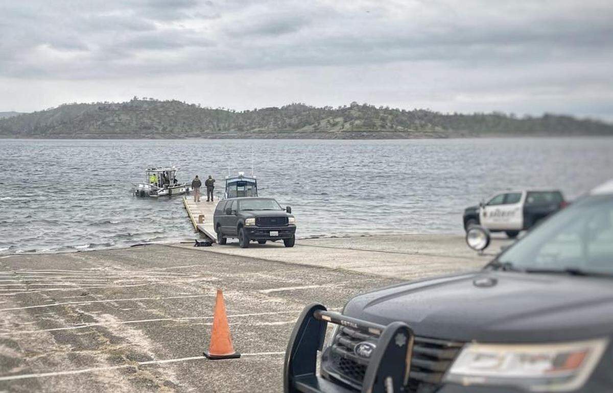 Search and Rescue team recovery a body at Millerton Lake amid a search for a missing diver.