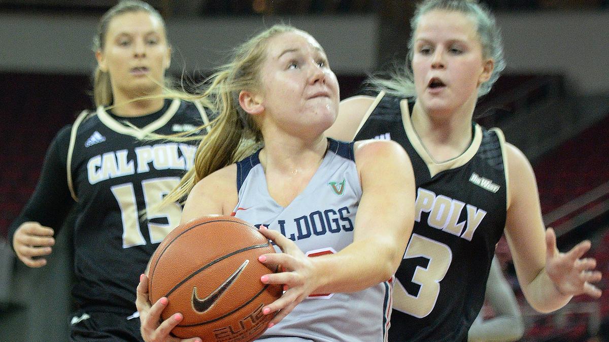Fresno State’s Bree Delaney, center, eyes the hoop while pressured by the Cal Poly defense in their game at the Save Mart Center on Wednesday, Nov. 14, 2018. on Tuesday, Nov. 20, Delaney scored a team-high 15 points in a win over Milwaukee.