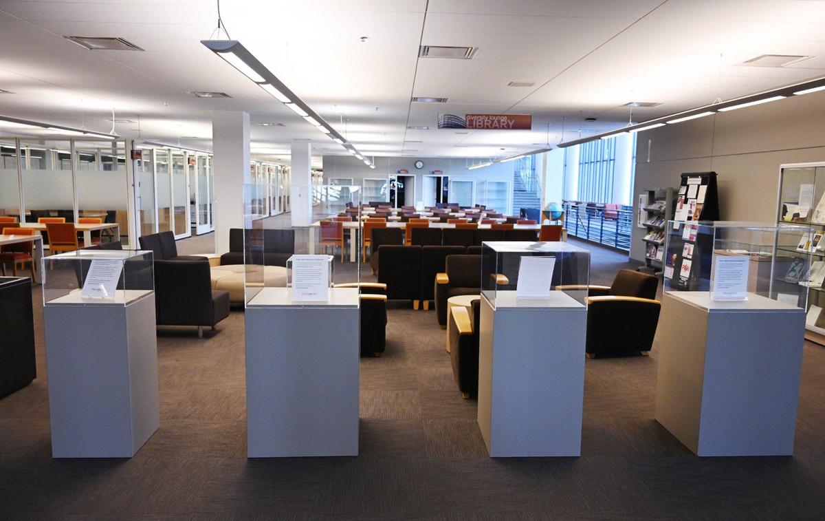 Four empty cases at the Leon S. Peters Gallery are seen on the second floor of Fresno State’s Library. All four cases featured local Native American basket art until recently removed for the CalNAGPRA repatriation process. Photographed Thursday, June 13, 2024 in Fresno.