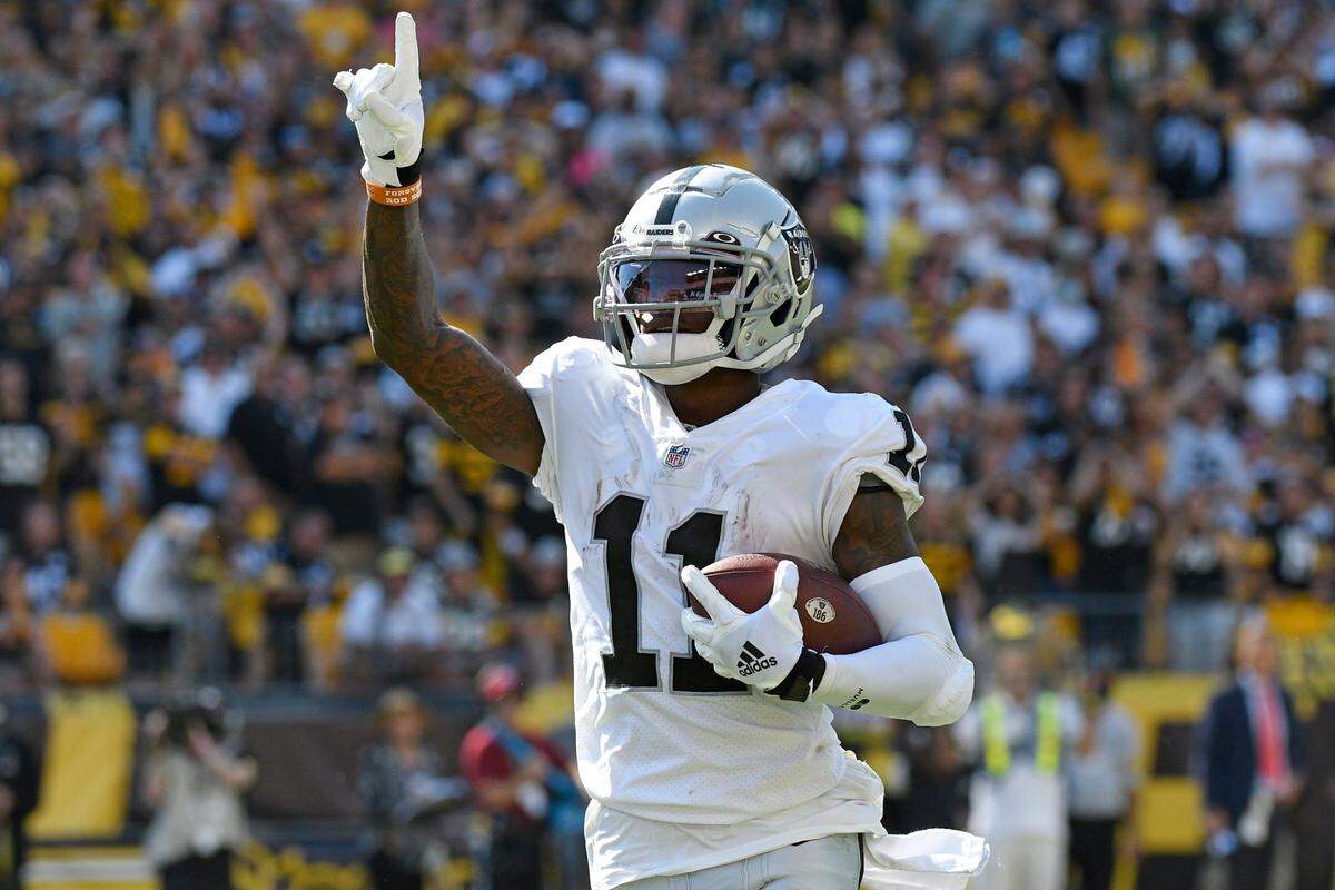 Las Vegas Raiders wide receiver Henry Ruggs III celebrates his touchdown during the second half of an NFL football game against the Pittsburgh Steelers on Sunday, Sept. 19, 2021, in Pittsburgh.
