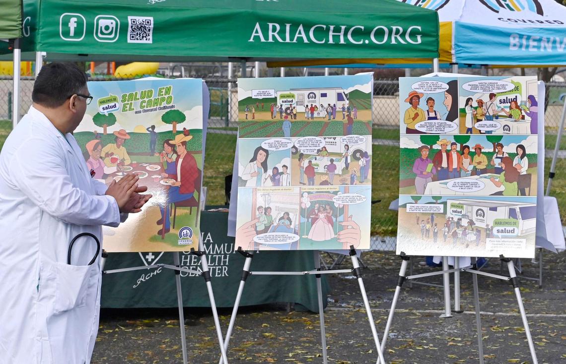 The new comic book advocating the need for health insurance and healthcare for the farmworker community is unveiled during a Covered California event held in Mendota’s Rojas Pierce Park Thursday morning, Dec. 12, 2024.