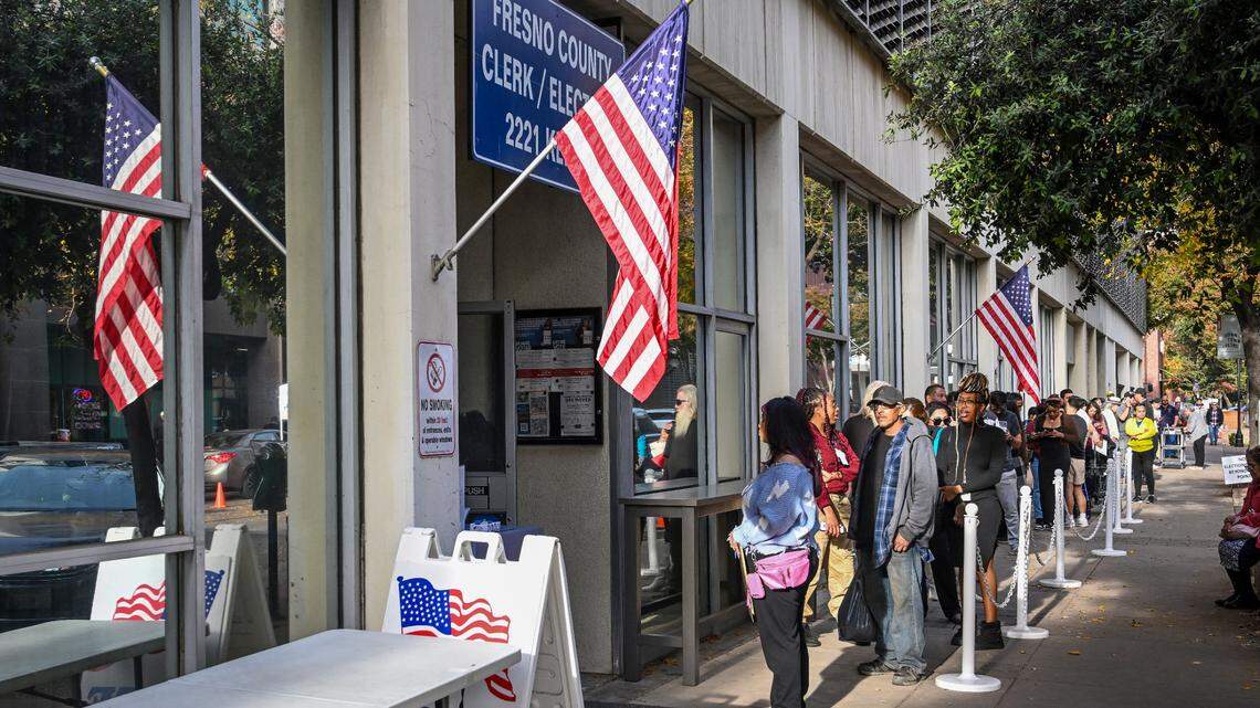 Voters wait in a long line outside the Fresno County Clerk/Registrar of Voters department in downtown Fresno on Election Day, Tuesday, Nov. 5, 2024.