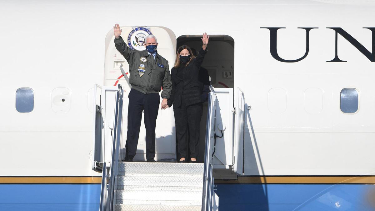 Vice President Mike Pence and Second Lady Karen Pence deboard Air Force Two before speaking in front of airmen and women at Lemoore Naval Air Station on Saturday, Jan. 16, 2021.