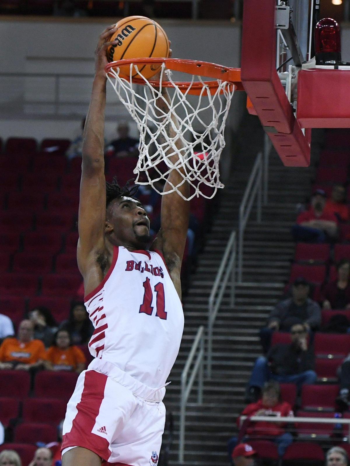 Fresno State center Isaih Moore dunks against Fresno Pacific Monday, Nov. 7, 2022 in Fresno. Moore had a double-double in his Bulldogs’ debut with 19 points and 10 rebounds.