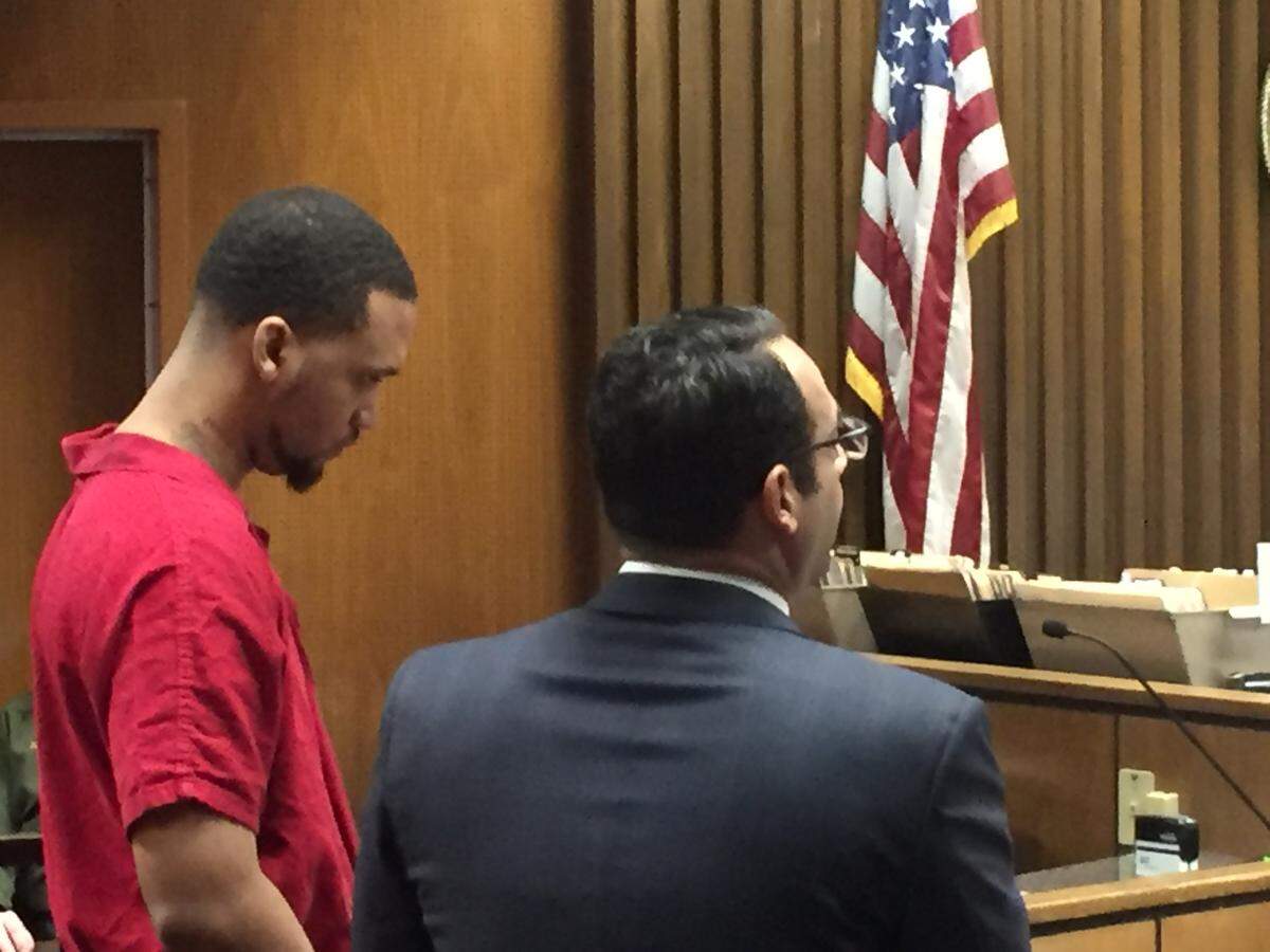 Michael Merritt-Hutchins stands with defense attorney Sam Salhab during his sentencing for drunk driving that killed two Fresno Bee newspaper carriers.