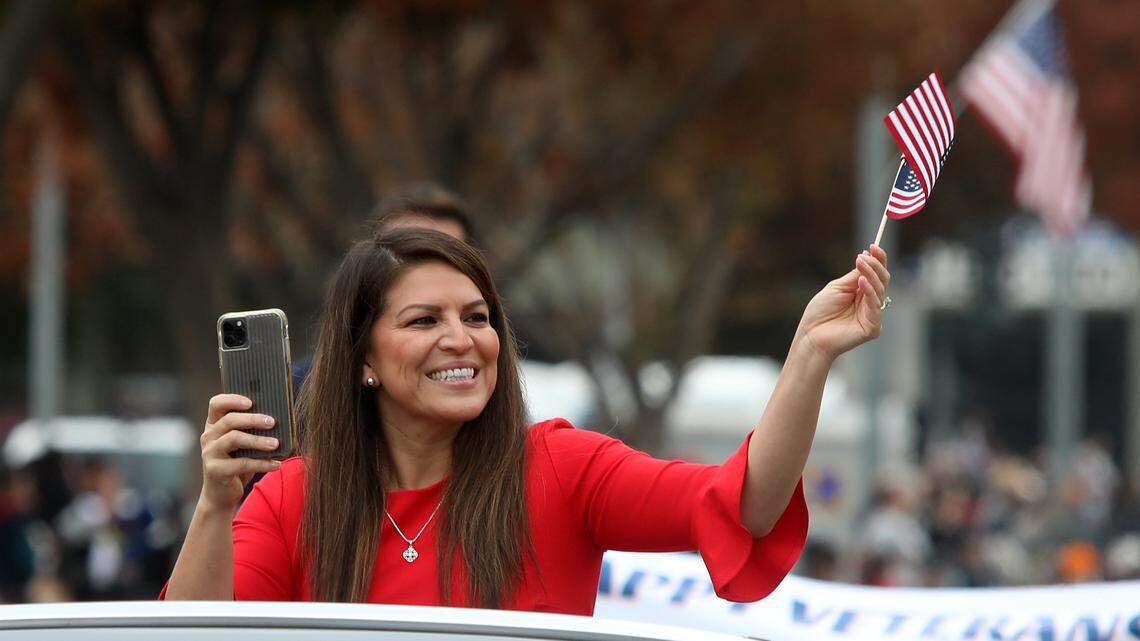 Fresno City Councilmember Esmeralda Soria waves along the Central Valley Veterans Day Parade route on Nov. 11, 2021.