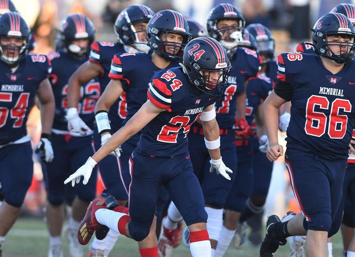 San Joaquin Memorial takes the field against Bullard on Friday, April 9, 2021 in Fresno. The Panthers won 29-2.
