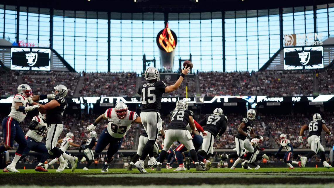 Las Vegas Raiders quarterback Chase Garbers throws a pass during the first half of an NFL preseason game against the New England Patriots, Friday, Aug. 26, 2022, in Las Vegas.
