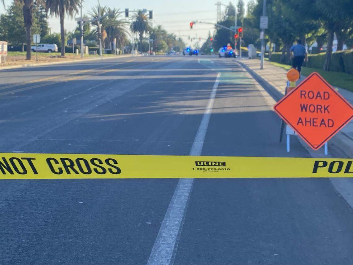Fresno Police blocked off Gates Avenue, towards Blythe Avenue after a pedestrian was killed by a semi truck on Tuesday, Aug. 12, 2025.