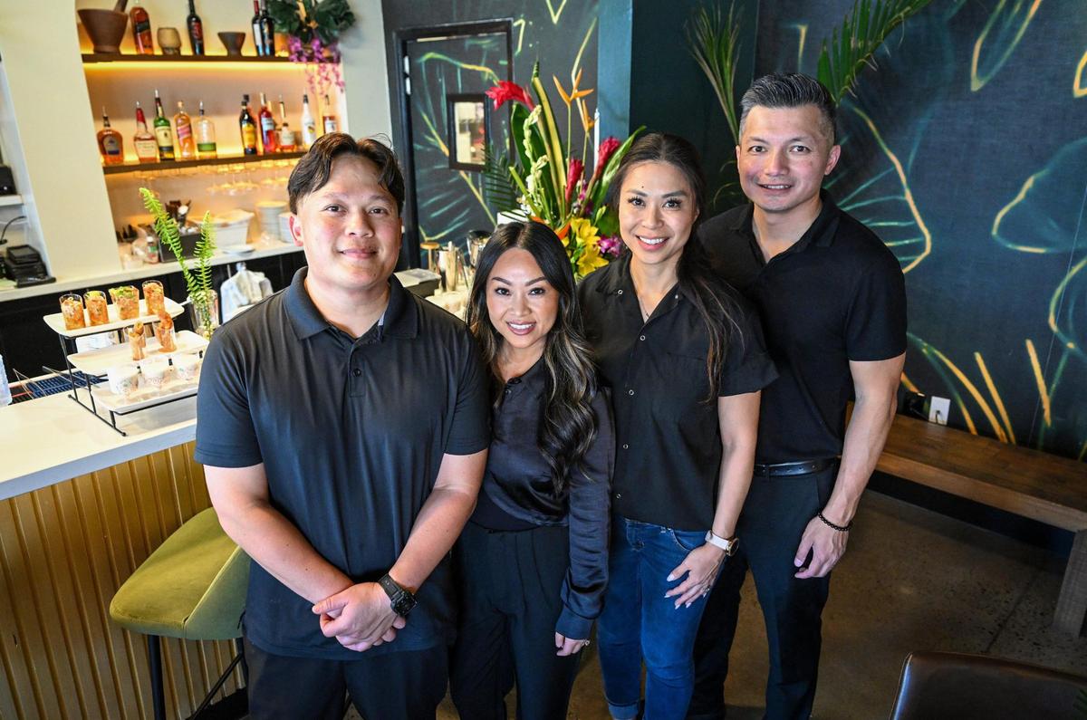 Co-owners, from left, Tito Thepkaysone, Sophie So, Anna Nguyen, and David Rasavong are photographed together during the grand-opening event of their restaurant Satay Thai Kitchen and Bar in north Fresno on Thursday, May 8, 2025.