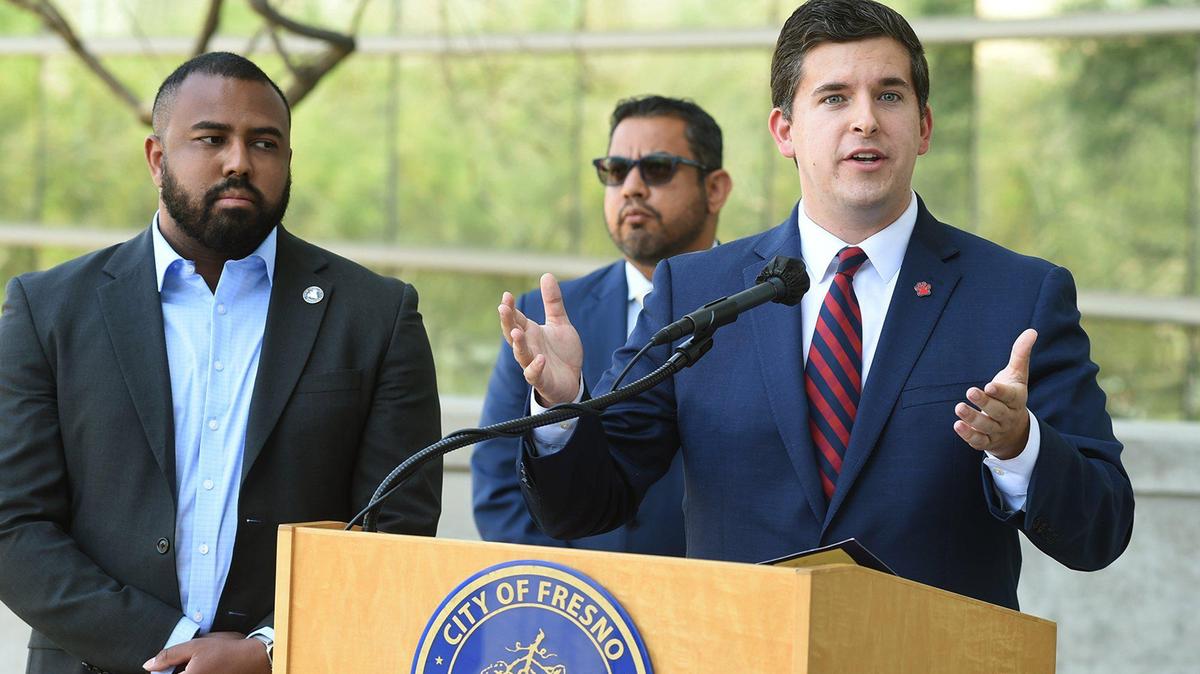 Fresno City Councilmembers Tyler Maxwell, right, Nelson Esparza,left, and Miguel Arias, join at a May 2021 City Hall press conference to talk about introducing a resolution to create Fresno’s Eviction Protection Program (EPP) which will allow the city attorney to seek outside legal counsel to represent tenants who are facing potential unlawful evictions. 
