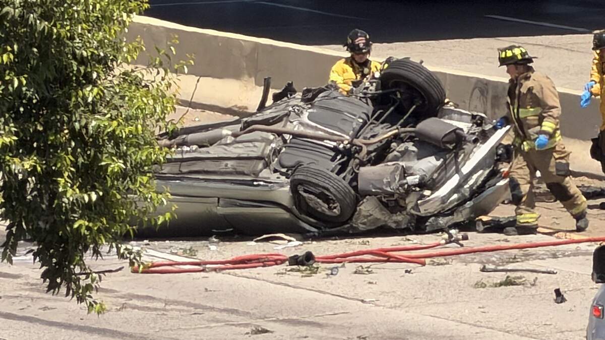 A vehicle went off the embankment and flipped before landing on Highway 99, near Ventura Street in Fresno, California on Friday, July 3, 2026. The driver was pronounced dead.