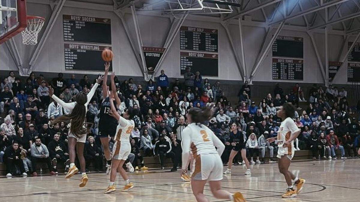 Clovis High forward Genevieve Tamondong goes up for a shot against Clovis West in a Tri-River Athletic Conference on Tuesday, Jan. 24, 2023. The Cougars defeated the Golden Eagles 52-51.
