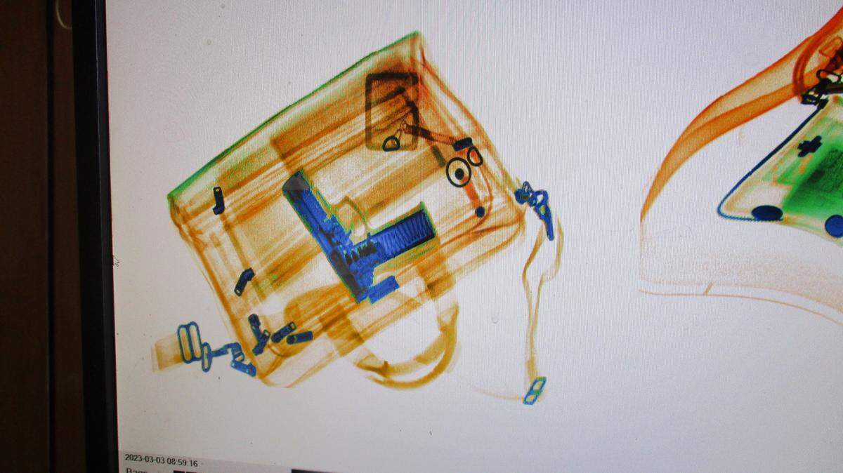 Image released by the Fresno County Sheriff’s Office shows what a firearm looks like as it passes through an X-ray machine.