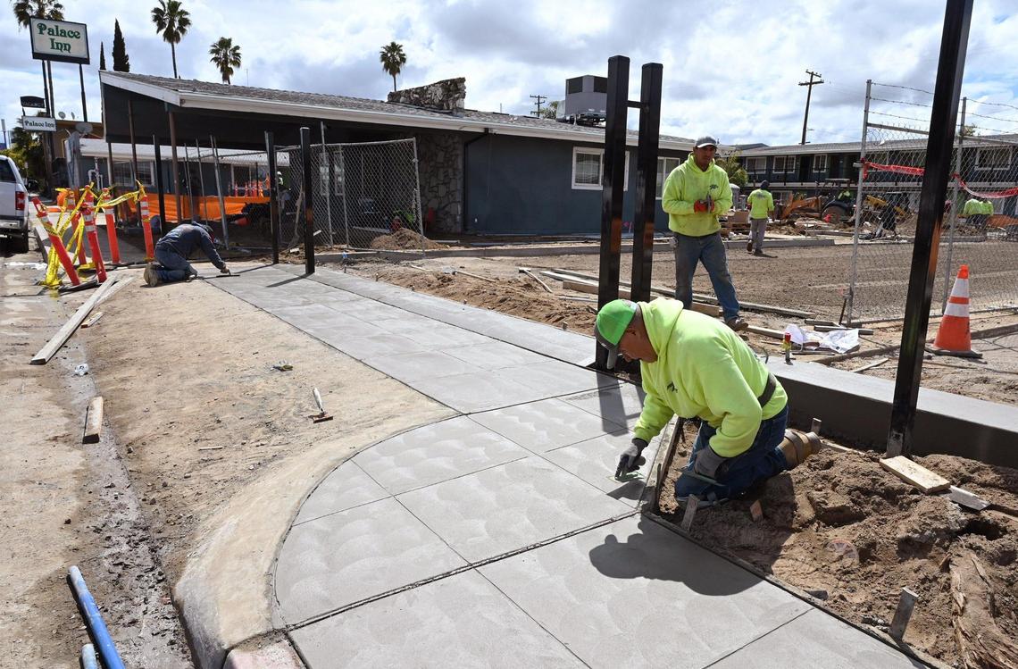 Renovation work including concrete work is seen at the Villa Motel along Parkway Drive Thursday, March 30, 2023 in Fresno.