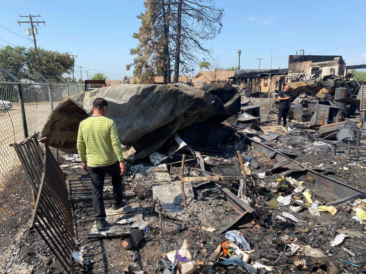 Gregorio Rodriguez shows where his Mexican bakery, La Potosina, was located in Poplar before it burned down on July 9.