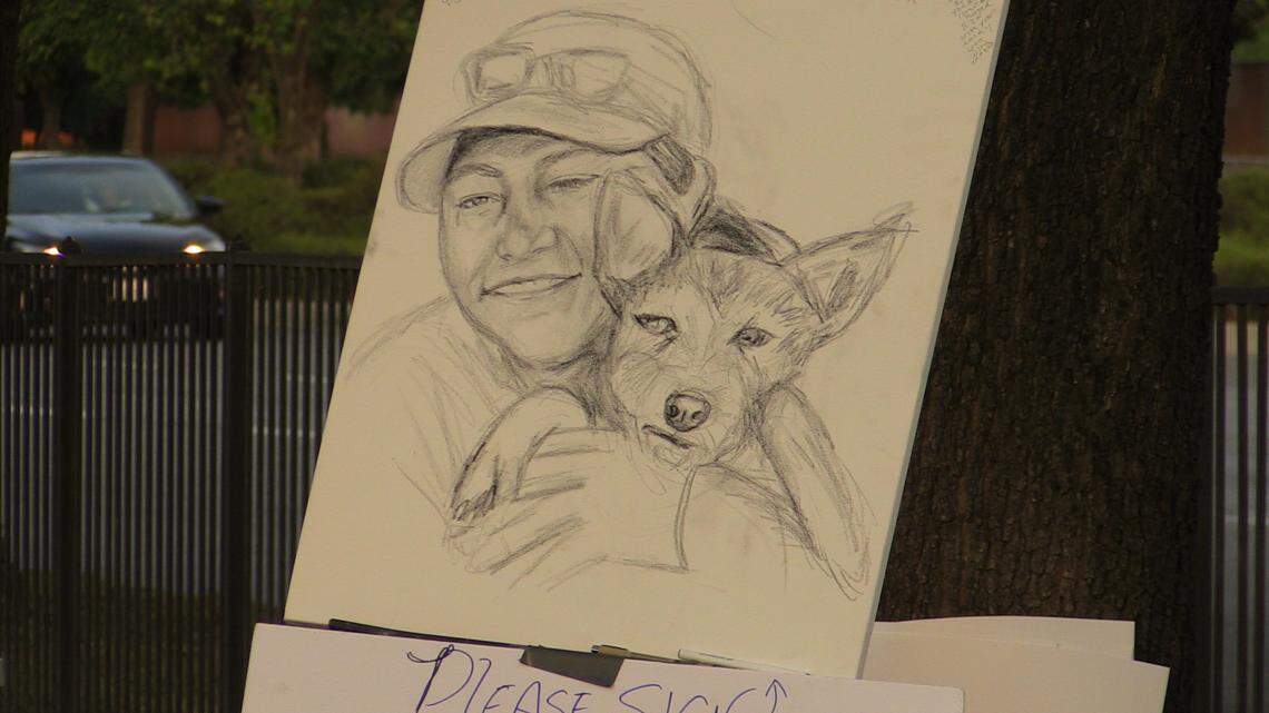 A sketch drawing of Monique Contreraz and her dog Lucky seen at the Citywide Candlelight Vigil on Wednesday, May 25, 2022. Contreraz and her dog were killed in a hit-and-run on May 13.