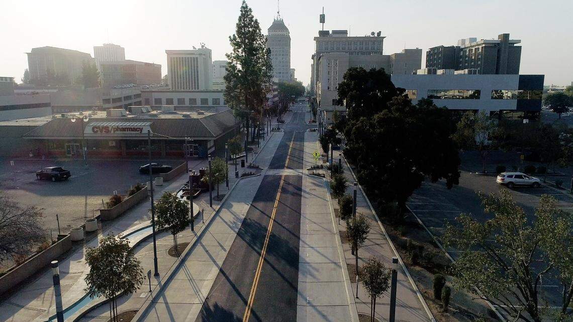 An aerial drone image of downtown Fresno looks south on Fulton Street from Tuolumne Street. The city wants to improve infrastructure, including additional parking structures and upgraded sewer and water lines, to spur more residential development and, in turn, a more vibrant retail and leisure environment, to downtown.