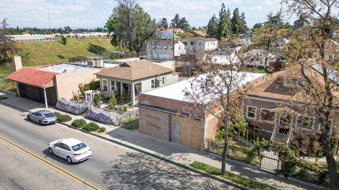 A small building space, at center, on 234 N. Broadway near the Highway 180 freeway photographed on Thursday, March 27, 2025. The building is one of several sites around downtown Fresno that the Incremental Development Alliance is working to develop. Inc Dev, is a nonprofit alliance that empowers small developers and local communities to create stronger neighborhoods through incremental, bottom-up development.