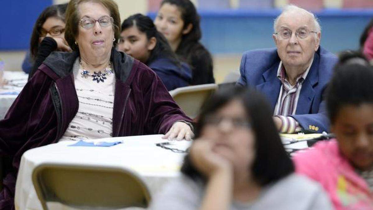 Francine and Murray Farber of Fresno watch as seventh graders from Tehipite Middle School are recognized as being on track to become Steve’s Scholars during a luncheon at the school in 2015. File photo