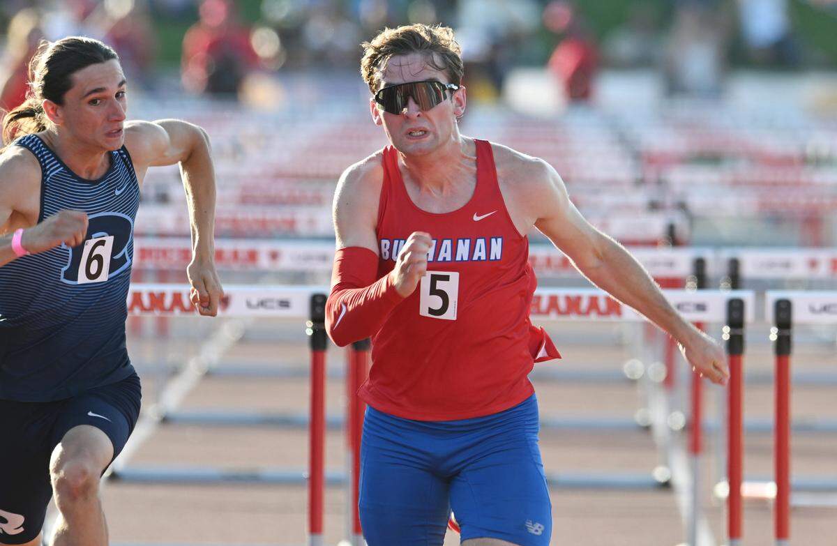 Buchanan’s Hudson Hergenrader wins a 110-meter hurdles qualifier for the finals at the CIF Track & Field championship qualifying events Friday, May 30, 2025 in Clovis.