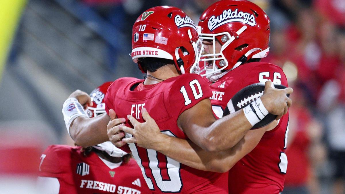 Fresno State’s Nick D’Ambra, right, celebrates with Logan Fife after a 2-point point conversion in the Bulldogs’ 53-10 victory over Kent State Saturday, Sept. 23, 2023 in Fresno.