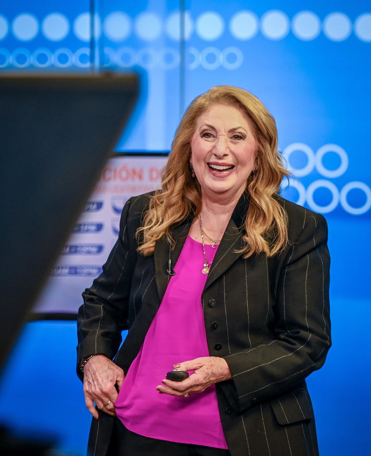 Lupita Lomeli of Fresno’s Univision Channel 21 smiles while taping the morning show at the station’s studio in Fresno on Friday, May 3, 2024.