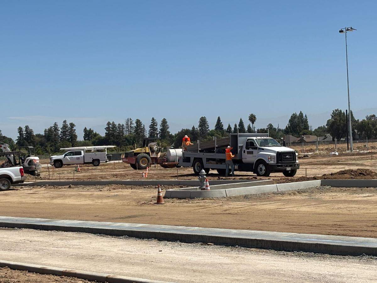 A crew works on the first phase of a 49-acre park in southeast Fresno that Councilmember Brandon Vang said Thursday, Aug. 7, 2025, will be called Southeast Fresno Sports Complex.