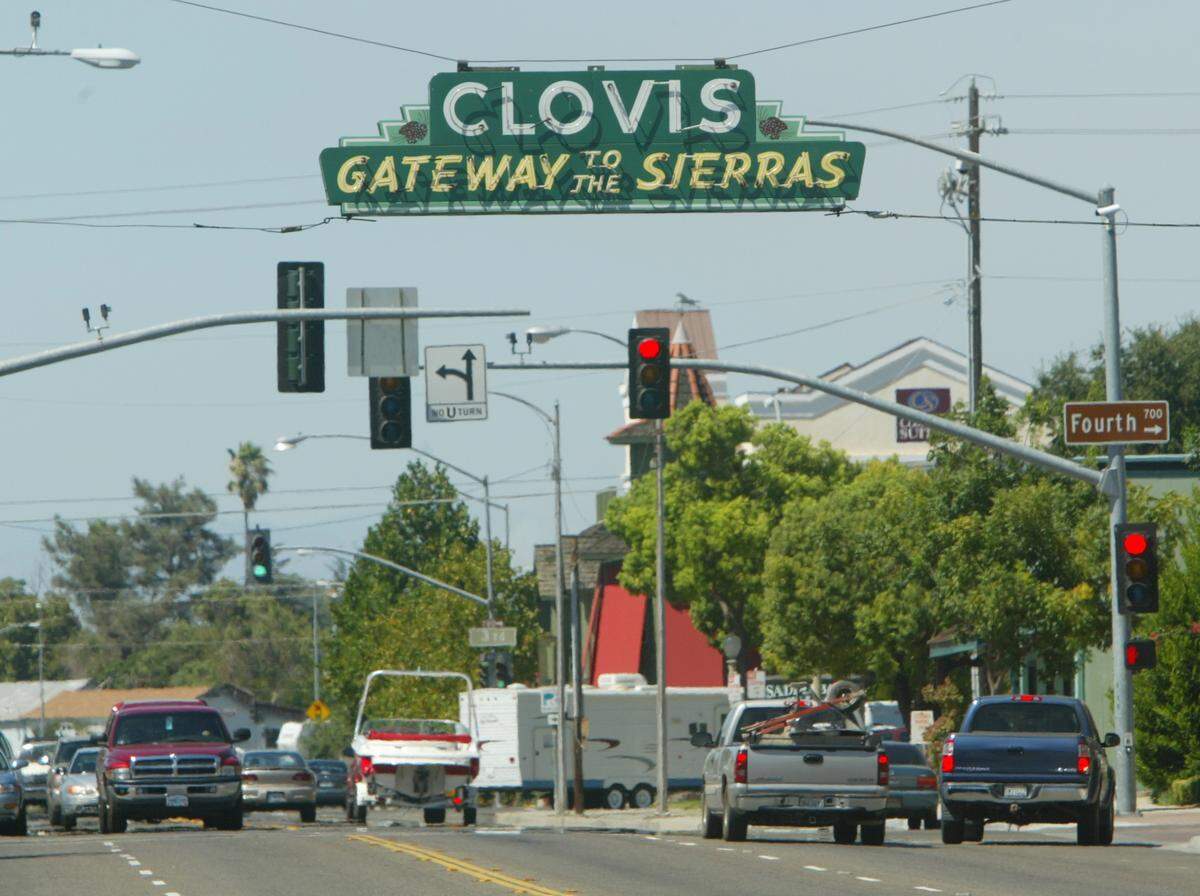 The neon Gateway to the Sierras sign marking the entrance to downtown Clovis at Clovis Avenue and Fourth Street is seen in 2005. The Fresno County city is among the safest and most affordable in the United States, according to GoBankingRates.