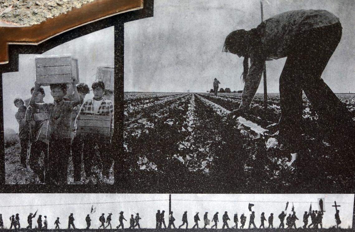 Images of farm workers are shown at the base of a statue of César E. Chávez at the university’s Peace Garden.