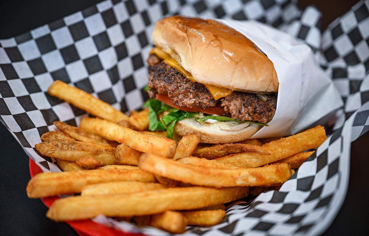 A cheeseburger and fries combo from Weekend Dreams Burgers & Grill in west Fresno. The popular eatery is celebrating 10 years of operation.