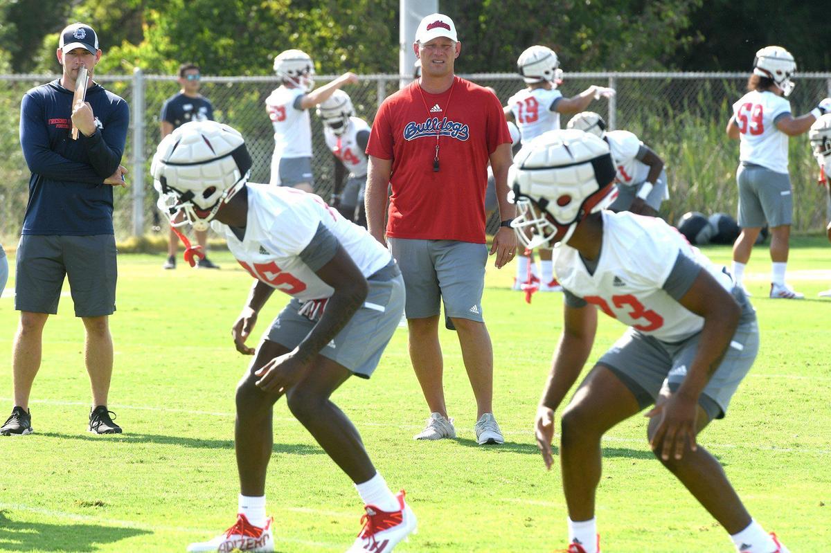Fresno State head coach Kalen&nbsp;DeBoer watches defensive players drill on the first day of fall practice, July 30, 2021.